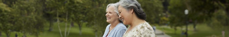 Two women smiling outside Two women smiling outside